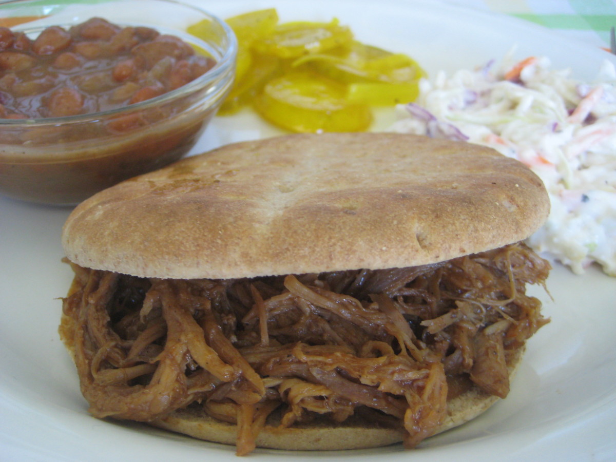 Pulled pork makes terrific sandwiches. It's a delicious, inexpensive casual party food as well. Serve with homemade beans, cole slaw, and sweet pickles.
