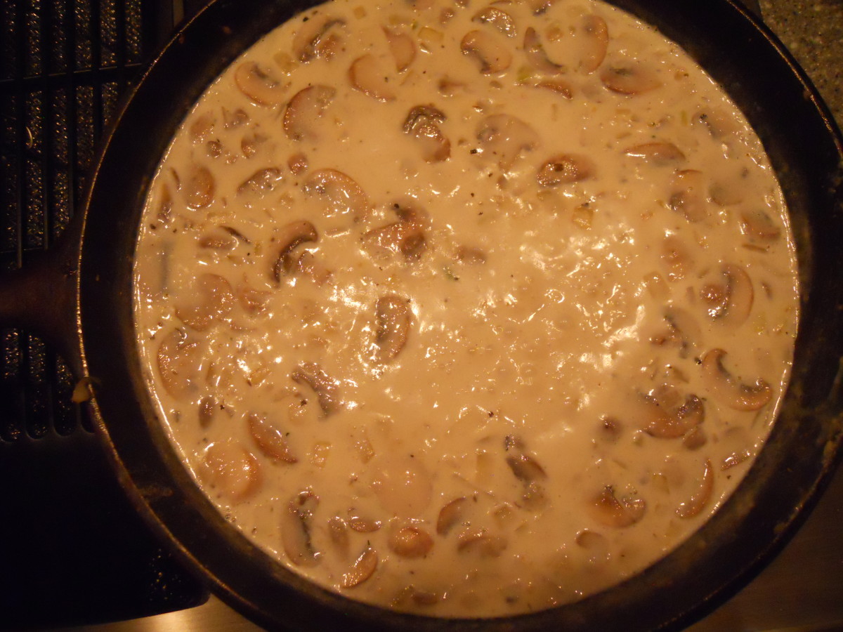 Add mushrooms, milk, and half-and-half.