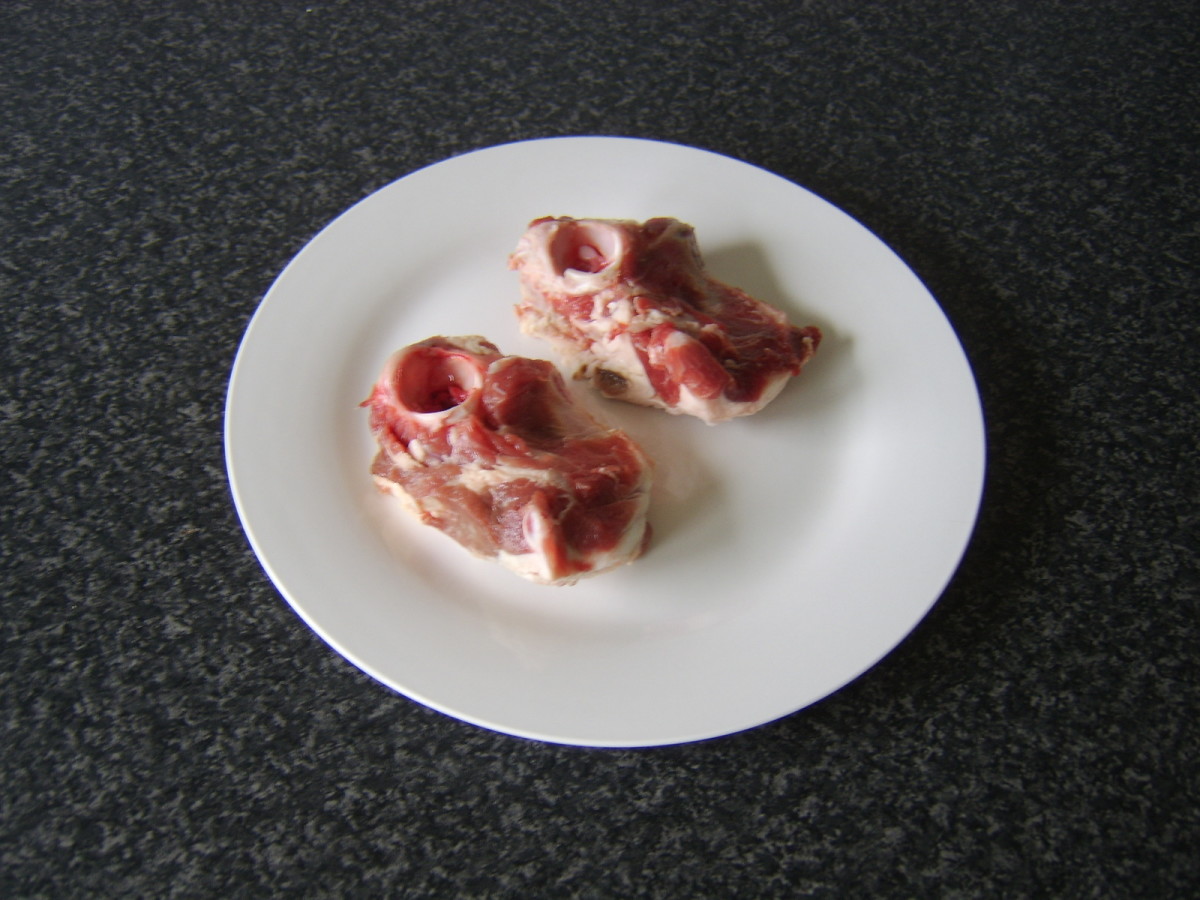 Lamb bones should be available extremely inexpensively from your butcher or supermarket.