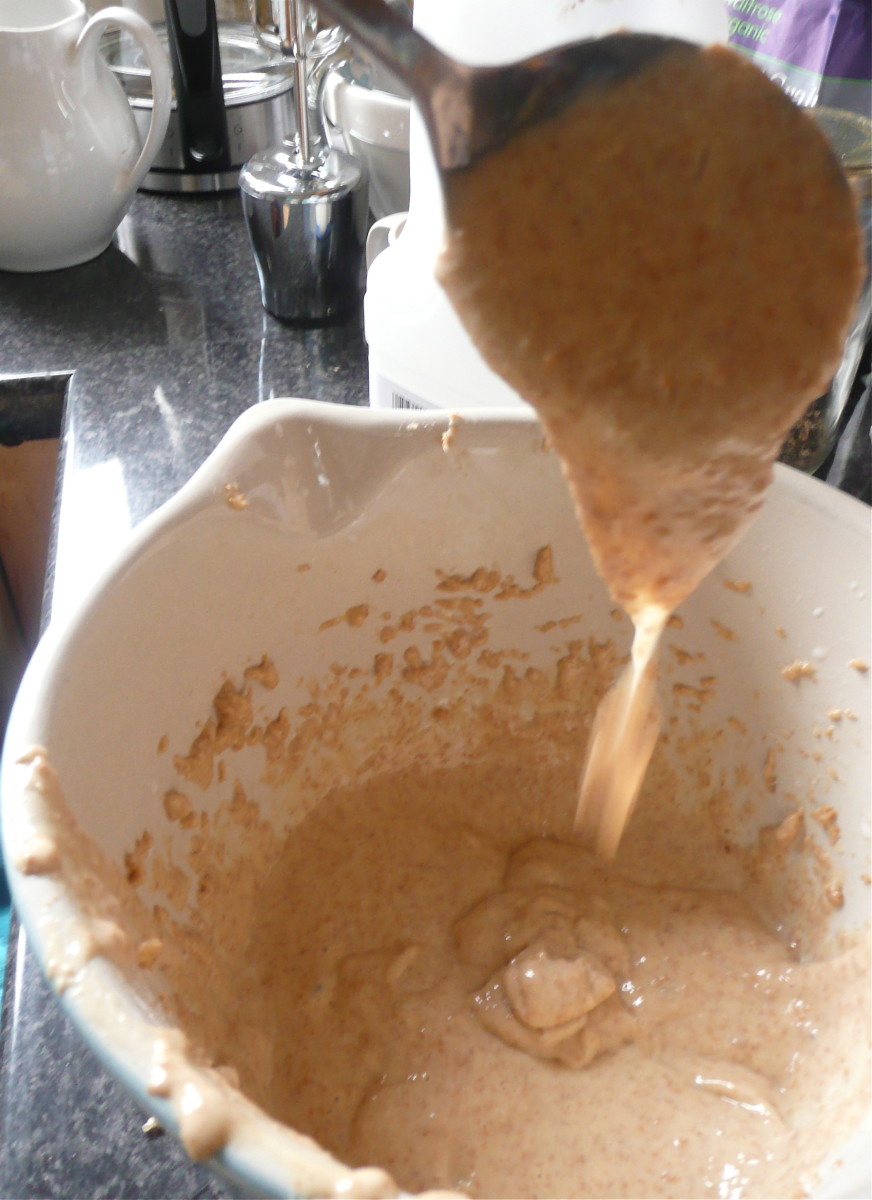 Add more milk until the batter achieves the right consistency. It should drop easily off a spoon.