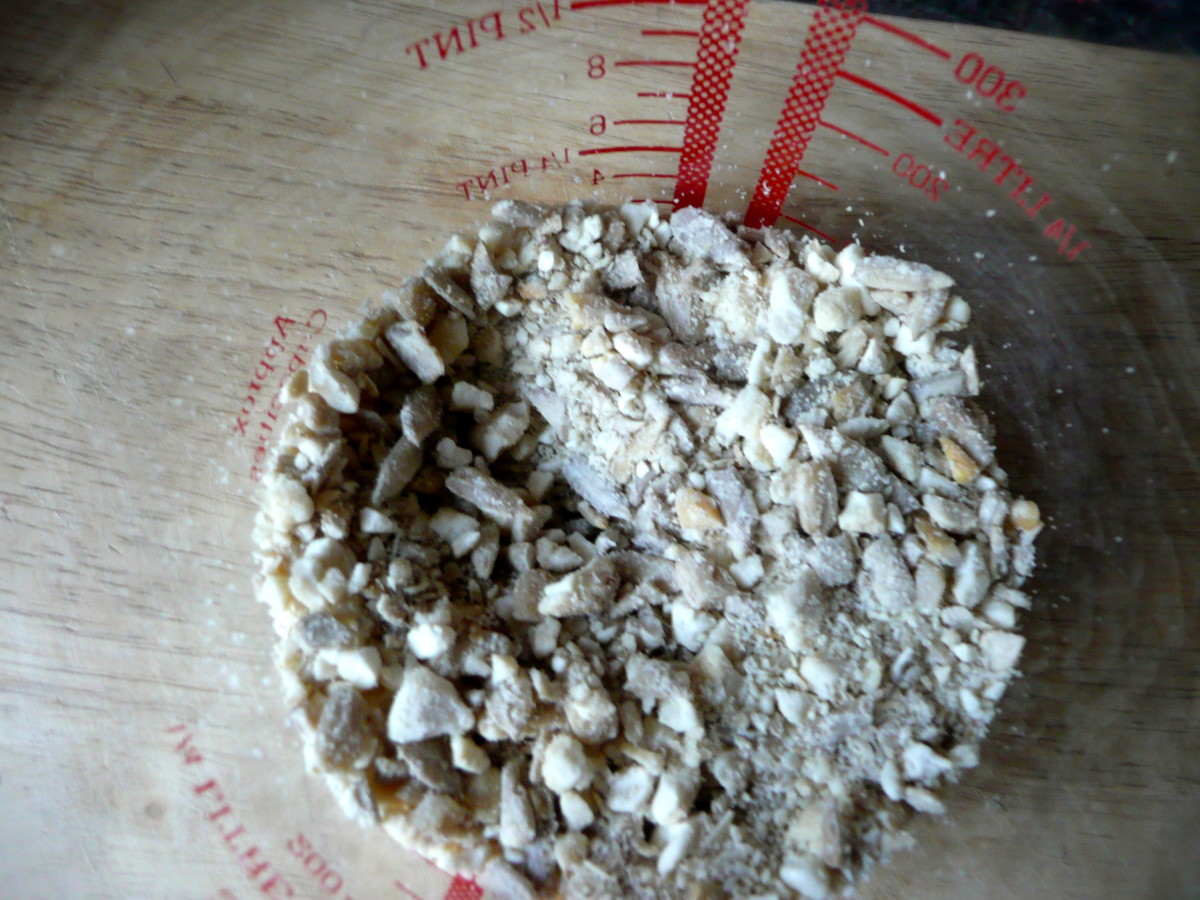 Grind the nuts or seeds in a food processor until the pieces are small and even. 