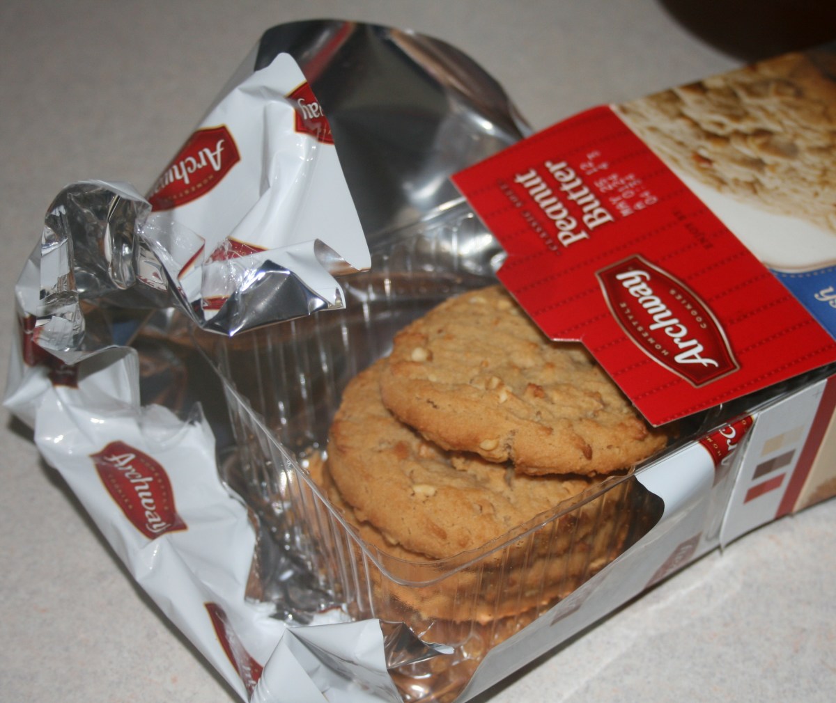 A box, a plastic carton and a wrapper? That's a lot of packaging for a dozen cookies!