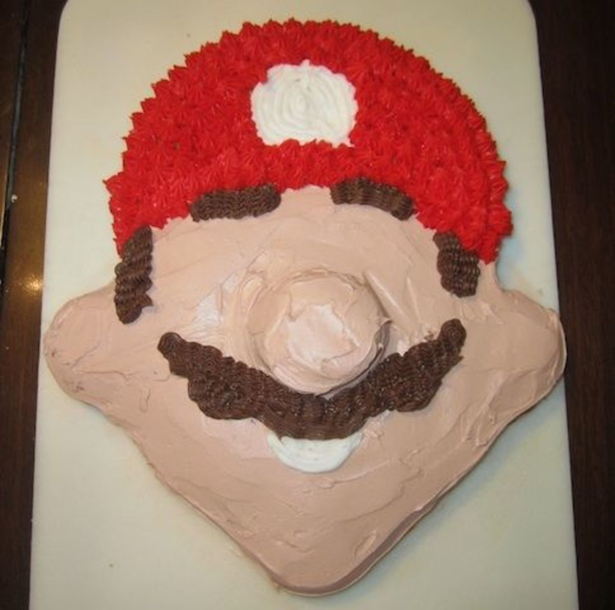 I used chocolate icing for Mario's eyebrows, sideburns, and infamous mustache.