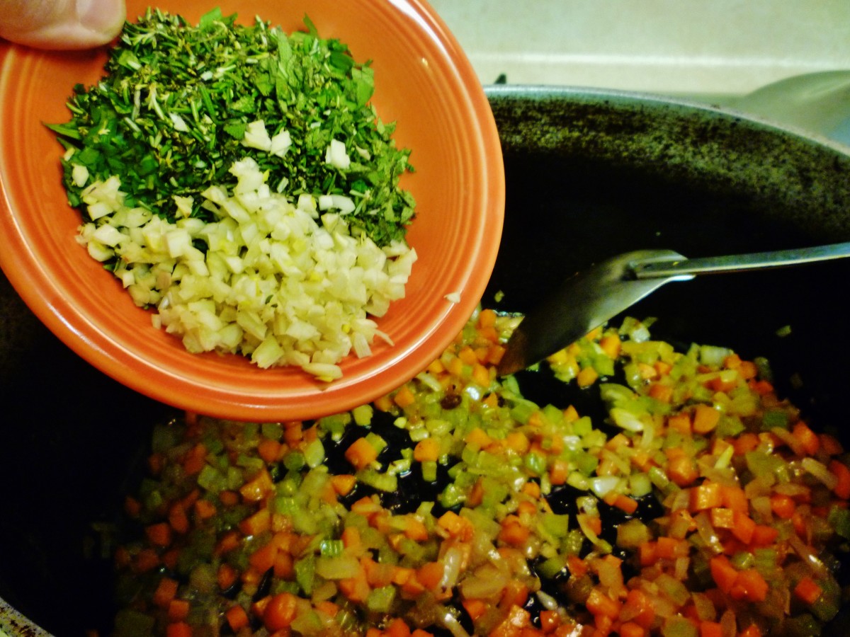 Add the garlic, parsley, rosemary and sage.