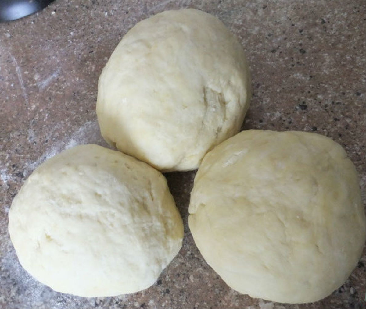 Step four: Divide the dough into three parts.