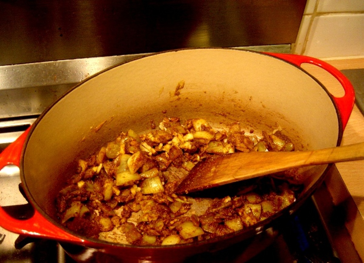 Fry the onions, spices and chicken gizzards