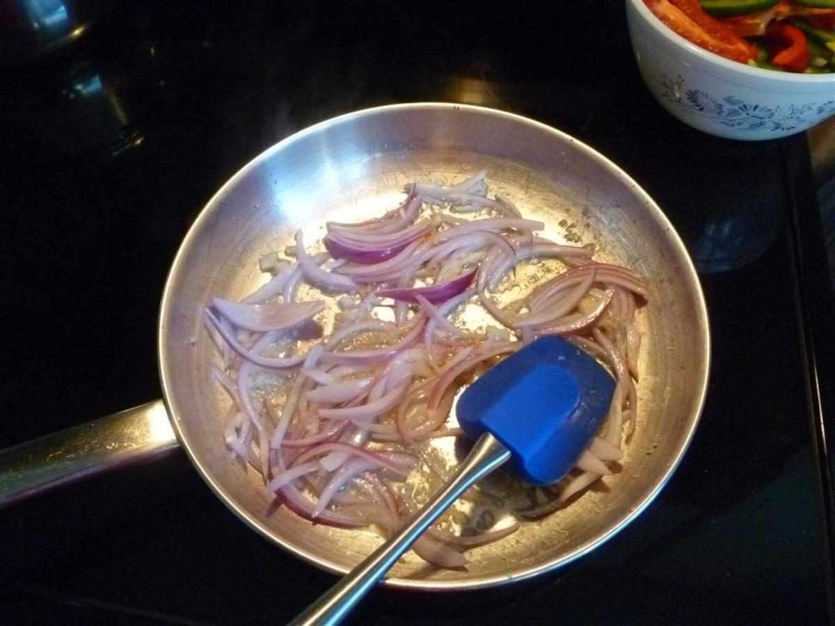 Cook the garlic and slivers of onion until they are translucent; about 2 minutes.