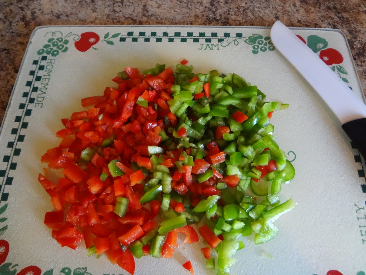 Dice the peppers, onions, and any other vegetables you are adding.