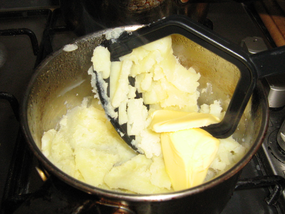 Mash the potatoes quickly to retain the heat. 
