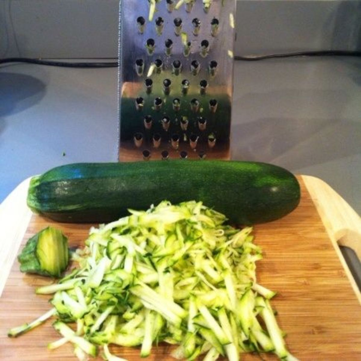 Preparing zucchini for freezing.