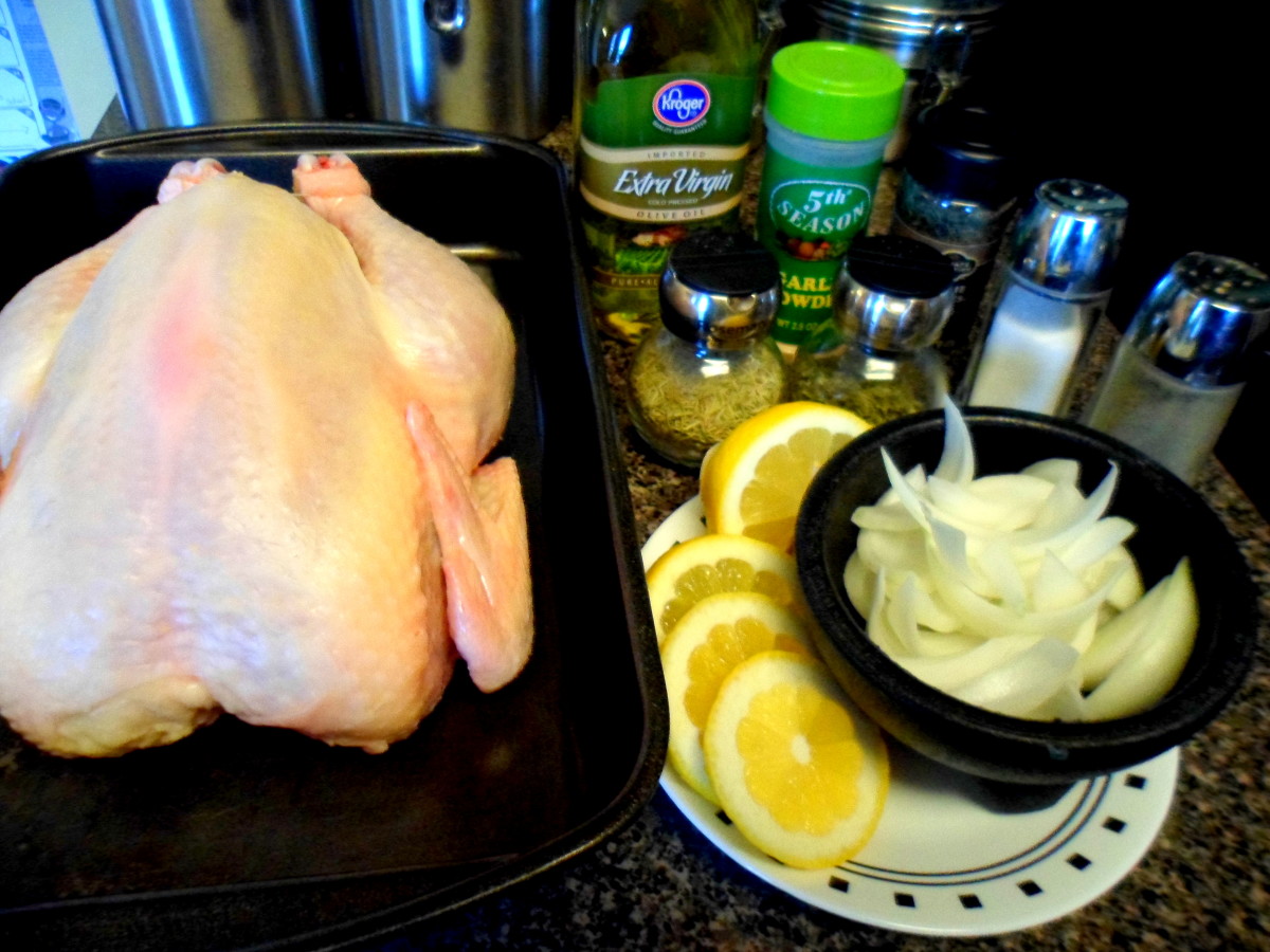 The ingredients to make lemon and herb roast chicken.