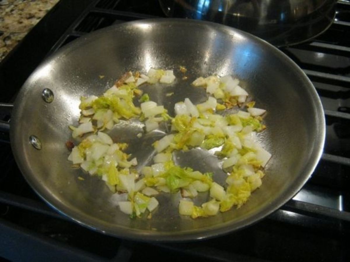 Heat butter in a small skillet over medium to low heat.  Brown your choice of onions and vegetables just until soft and golden brown.