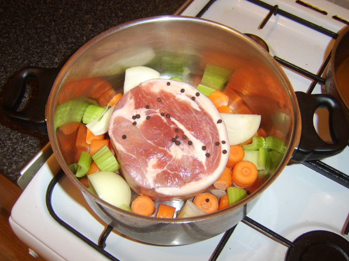 Ham, chopped vegetables and black peppercorns ready for water