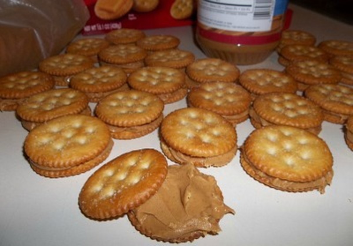 Spread the peanut butter between crackers. 