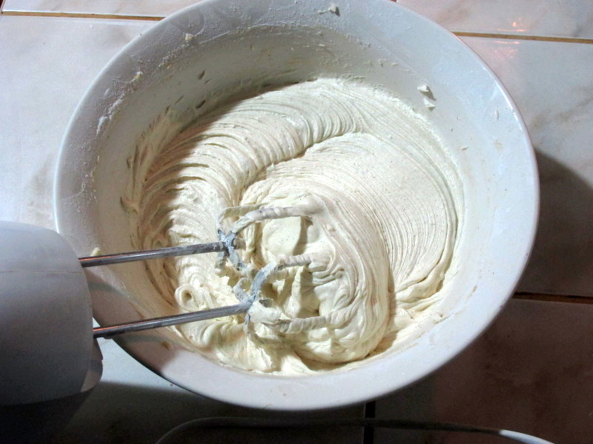 Using a hand or stand mixer, gradually add powdered sugar and whip until fluffy. 