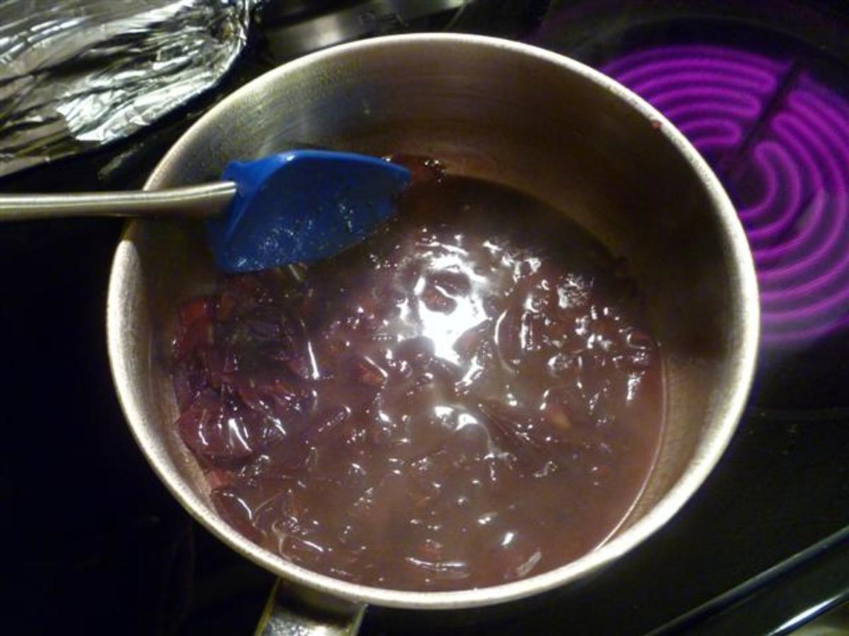 Once the red wine mixture has reduced to ½ cup, pour in the chicken stock.