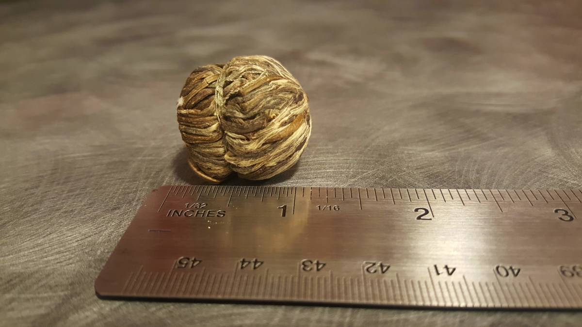Tea balls tend to be approximately an inch in diameter, and the ones from California Tea House are right on the money.