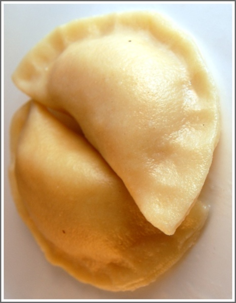 Pierogi is a potato filled dumpling. Thin dough is stuffed with potato, onion, cheese, or garlic, then sealed and boiled.