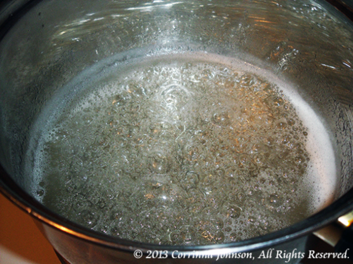 Boil sugar, corn syrup and water until it reaches 300 F. 