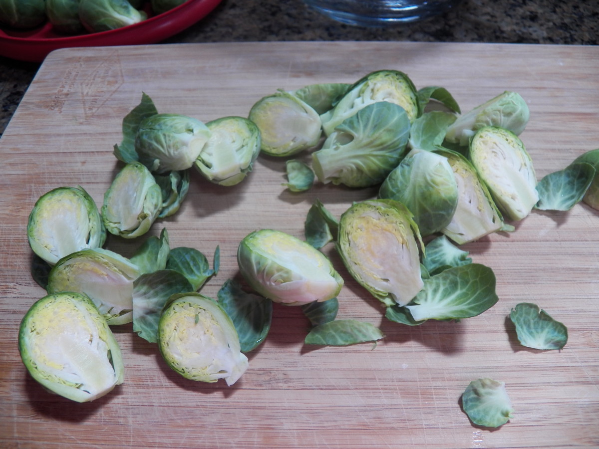 Cut Brussels sprouts in half lengthwise.