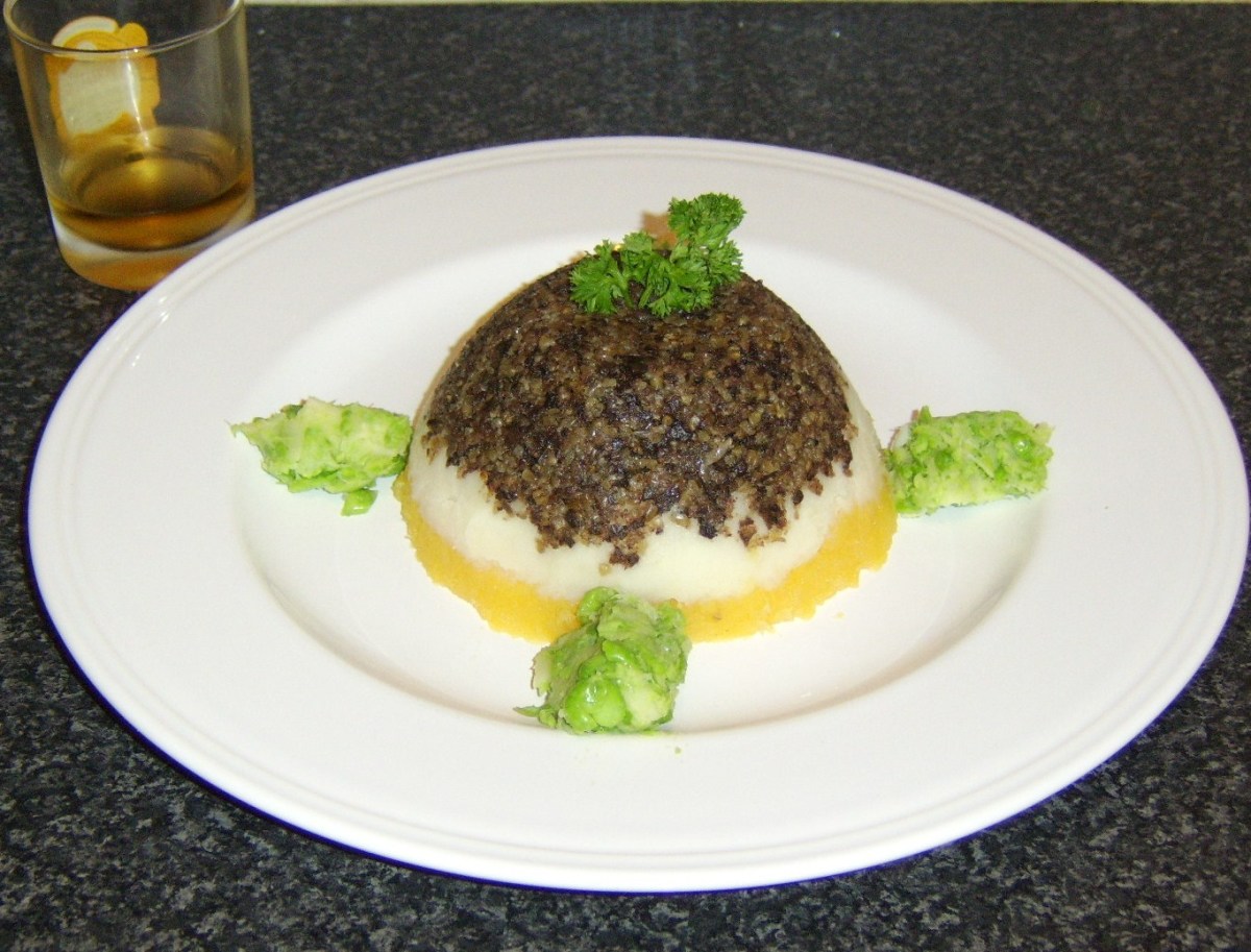 Haggis, tatties and neeps with pea puree and whisky.