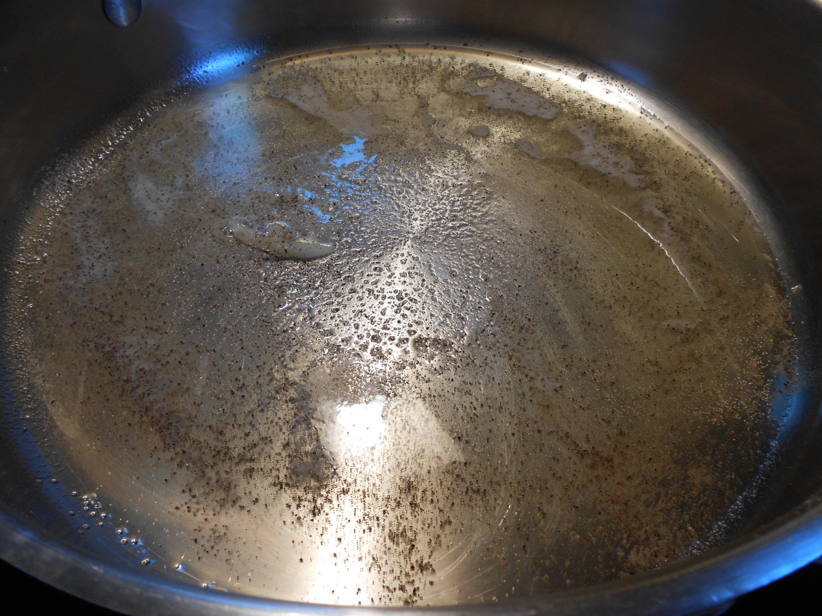 Sprinkle salt and pepper into hot oil in skillet.  