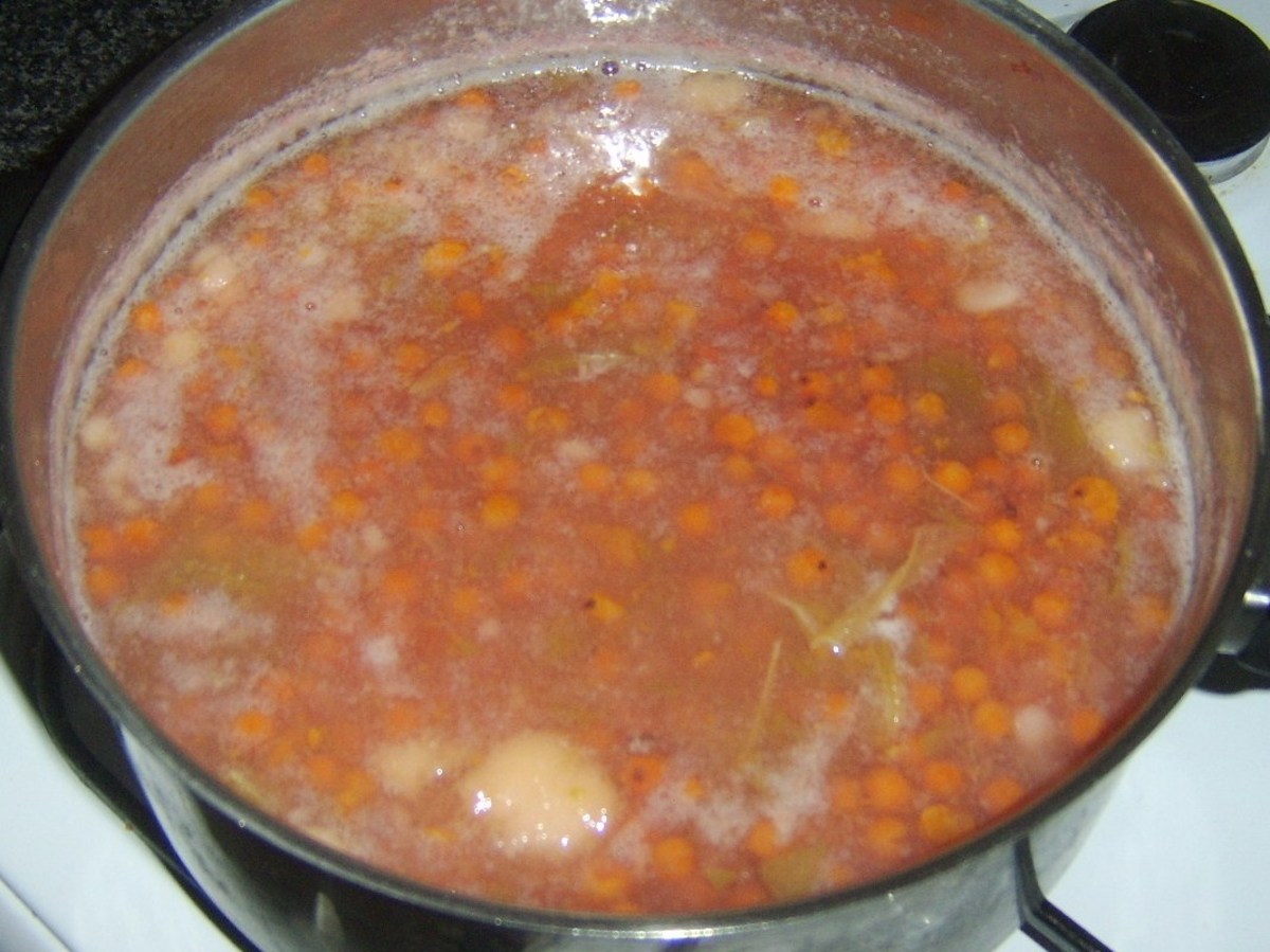 Stewed rowan berries and apples are left to partly cook