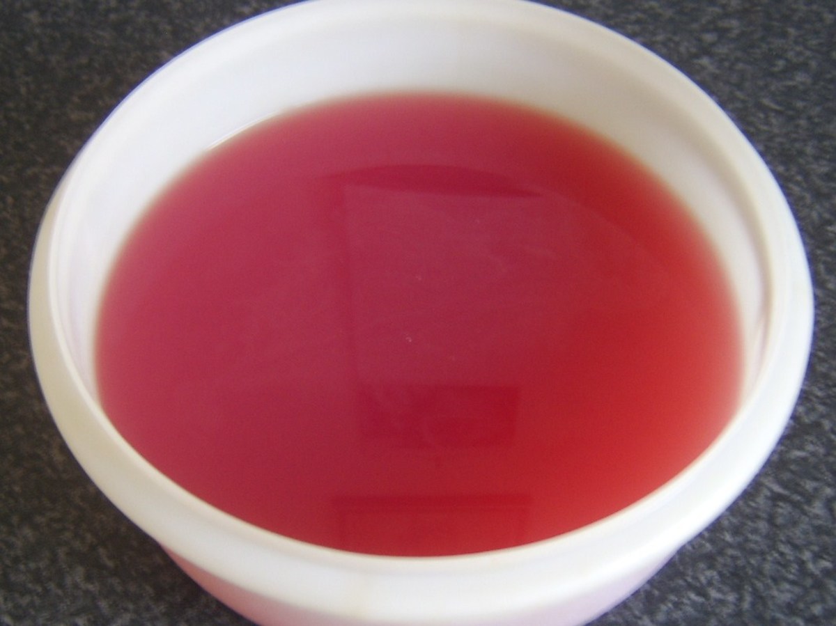 Strained rowan berry and apple juices