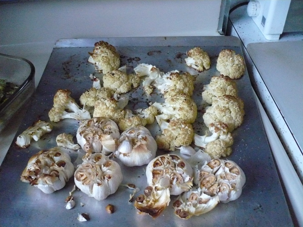Drizzle olive oil over the cauliflower, and place in the oven at 400˚F for 10 minutes.