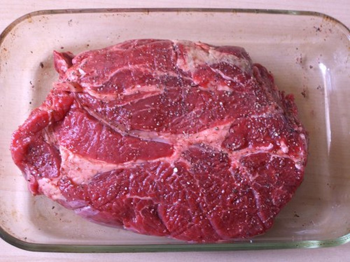 This is a chuck roast, sometimes called a blade roast. It's often used for pot roast, stew and other slow, wet cooking techniques.