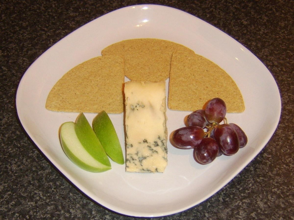 Stilton cheese with fresh fruit and oatcakes.