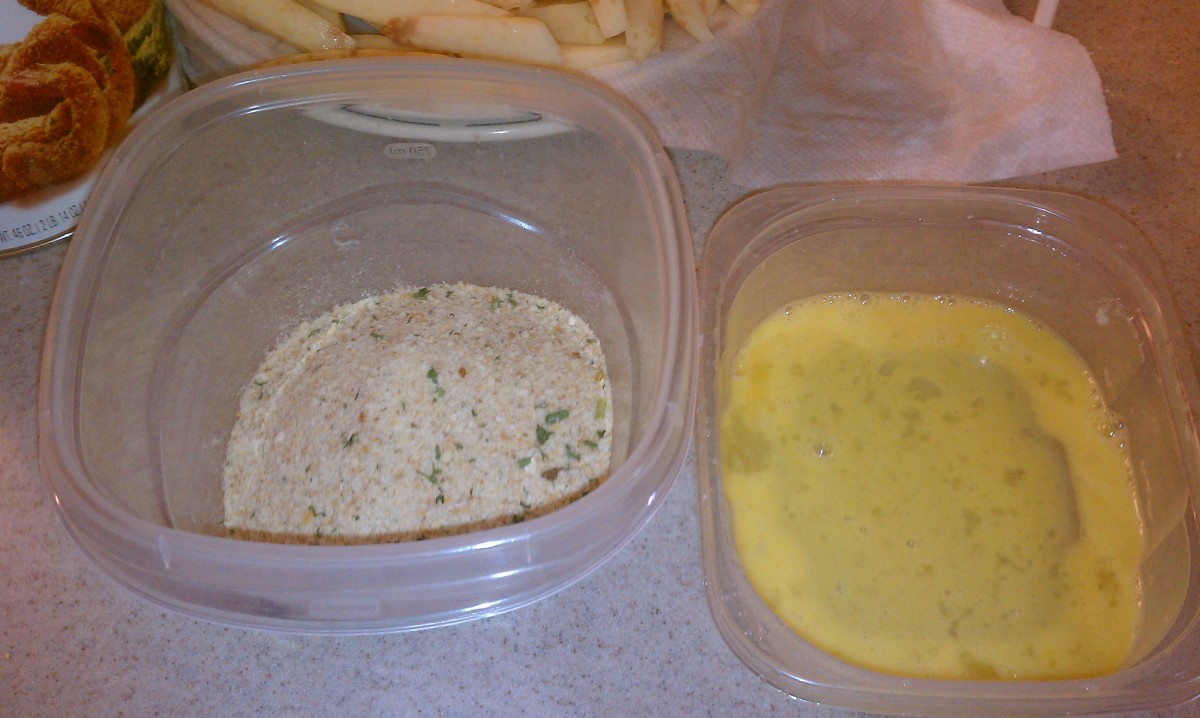 Place seasoned bread crumbs and a beaten egg in separate containers large enough for the fillets to fit into.