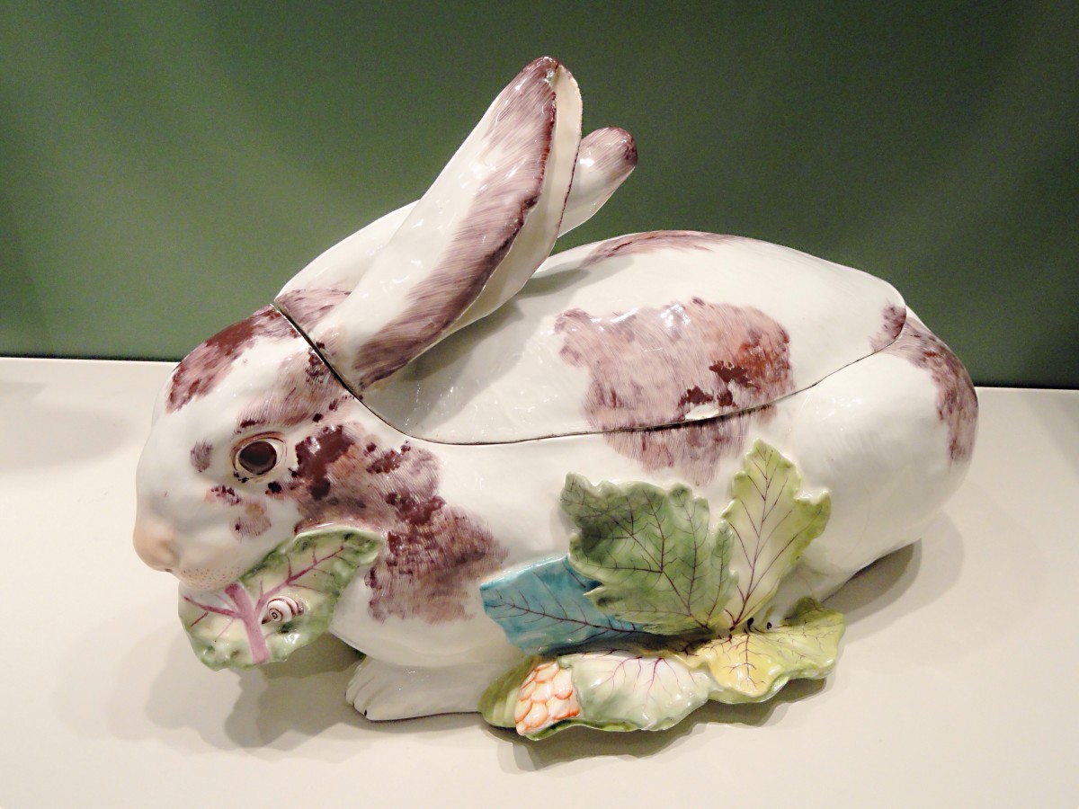 A rabbit-shaped soup tureen with its lid in place