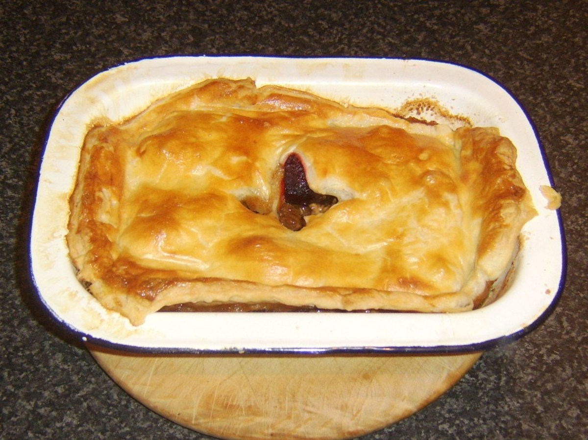 Steak beetroot and Stilton pie is rested before it is cut to serve