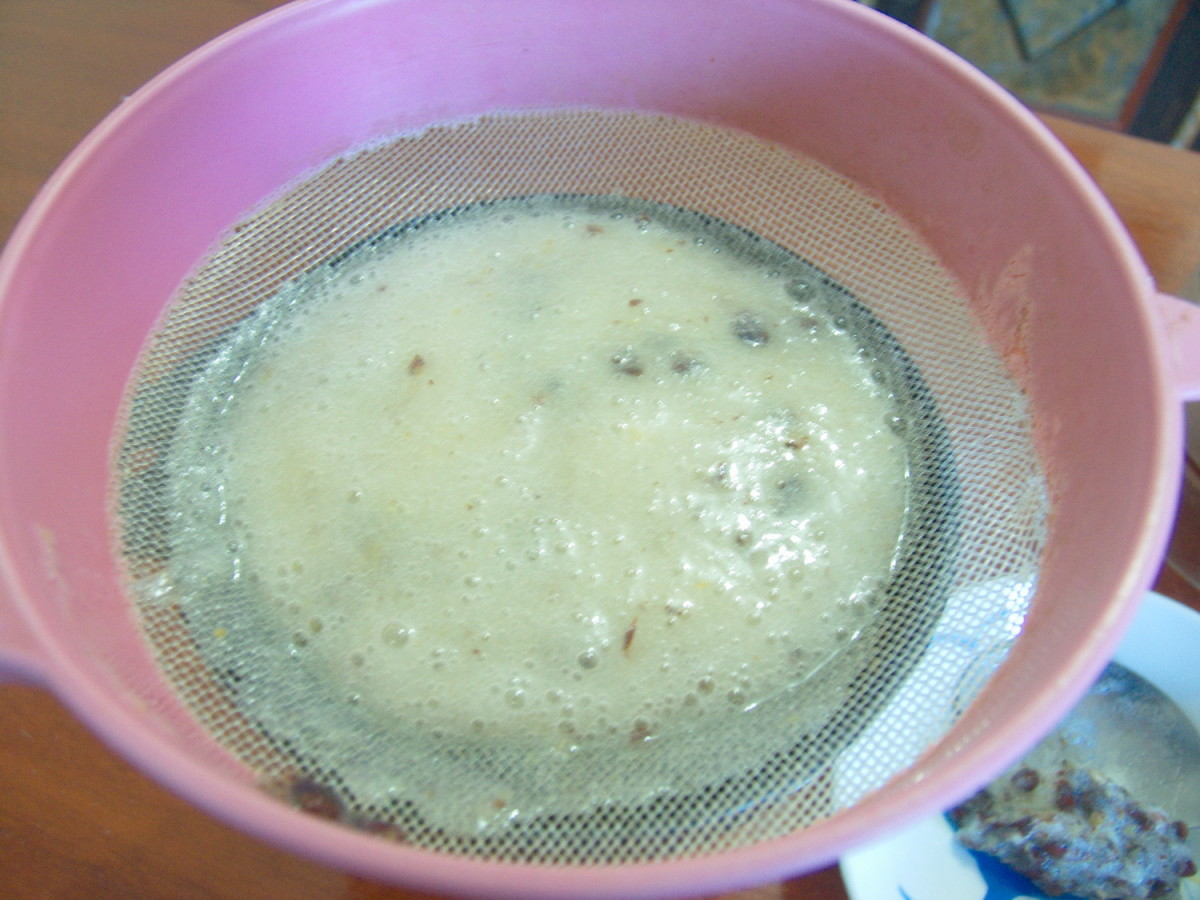 Pass noni juice through a sieve to remove seeds.