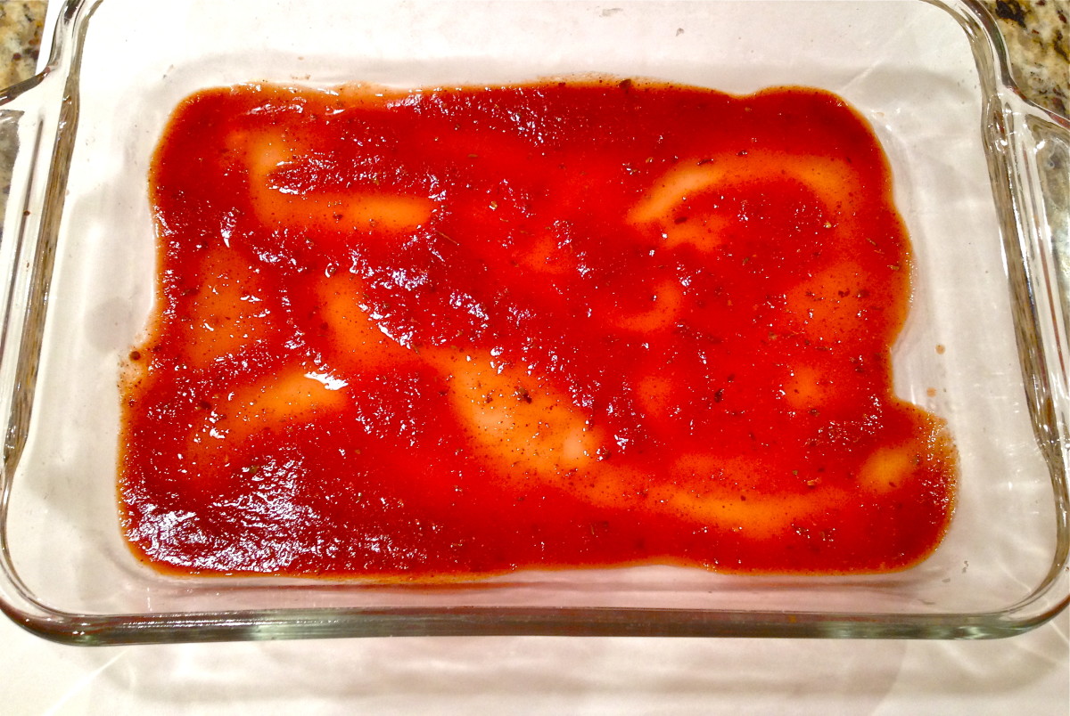 Pour about ½ cup of enchilada sauce in the bottom of a 3-quart rectangular baking dish.