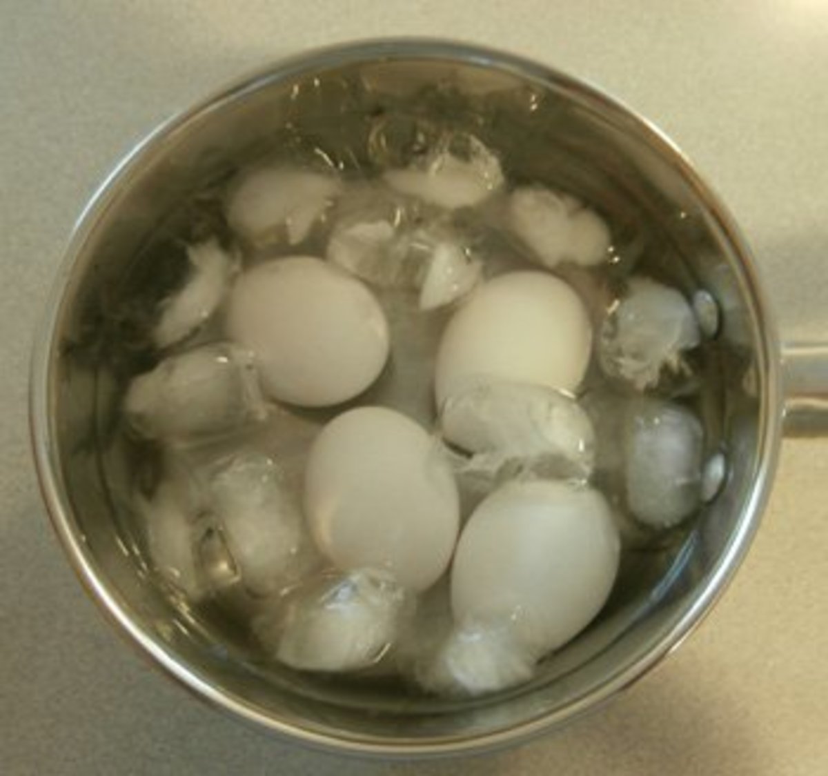 Cool eggs in ice cold water as soon as they're finished cooking.