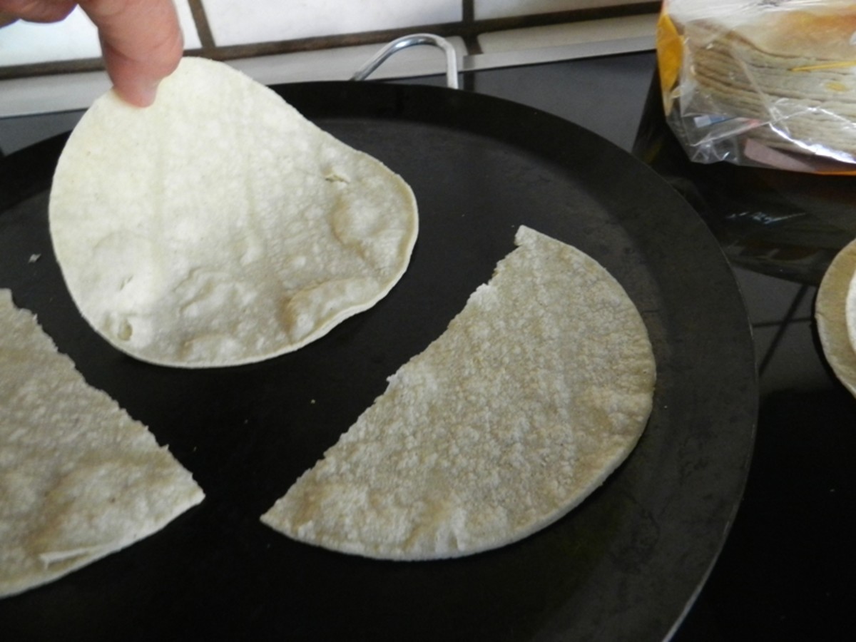 Start with a hot comal. Allow the tortillas to heat till bubbles rise. Flip and let light brown develop for extra crunch and flavor.