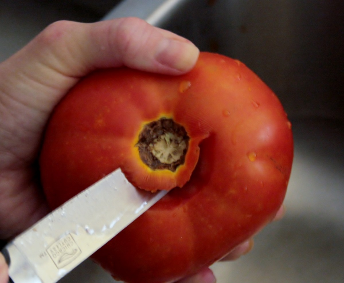Sometimes tomatoes are so ripe, you can peel them with your fingers after coring them.