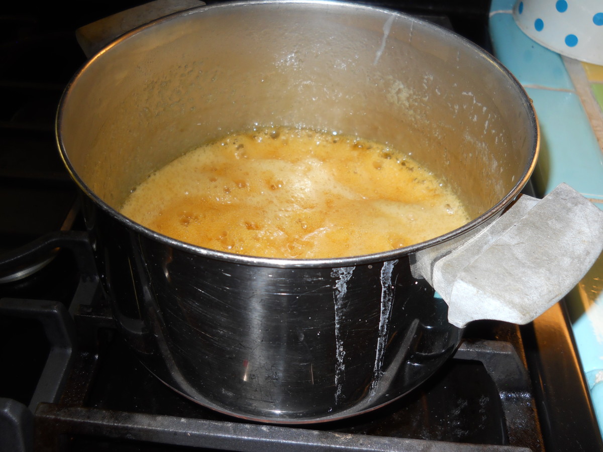 Make the Glaze in a Large Saucepan: The glaze will turn a darkish brown.