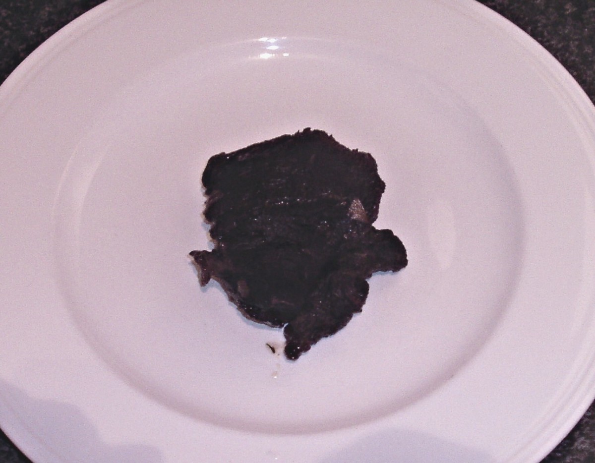 Braised ox cheek removed from pot.