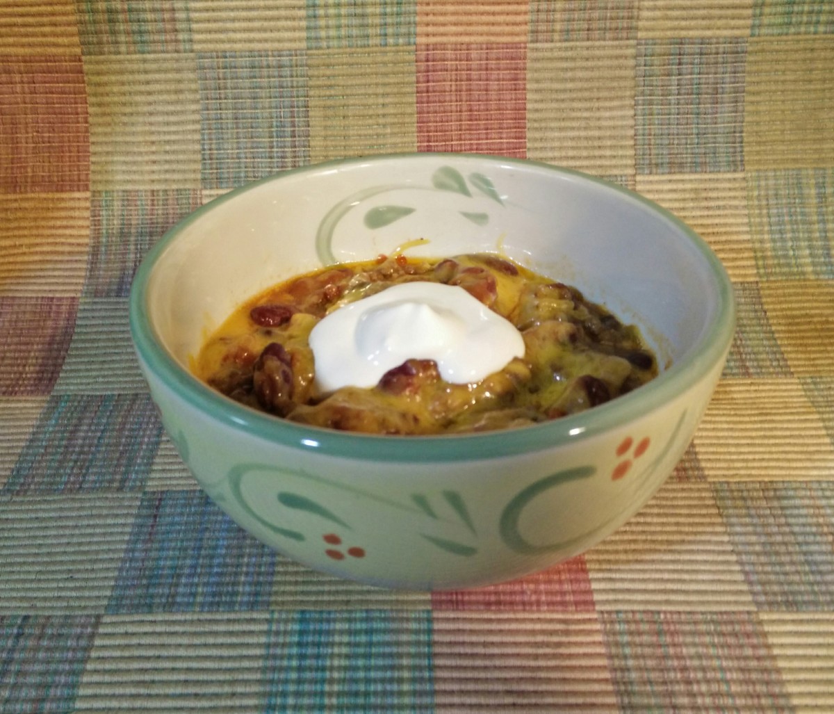 I like chili with more cheese and sour cream.  Yum, but contrary to what Oprah says, no bread.