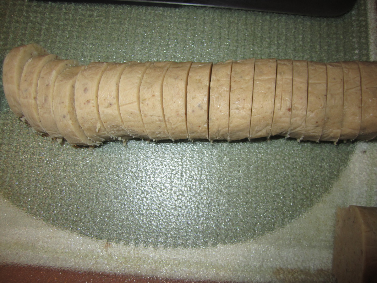 Pecan sandie log sliced into 1/4-inch rounds