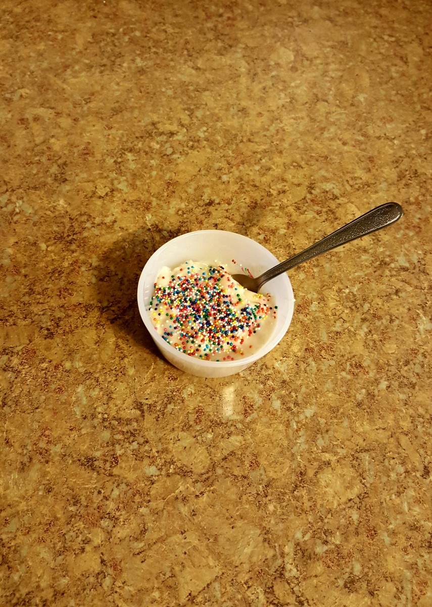 Homemade vanilla pudding topped with sprinkles.