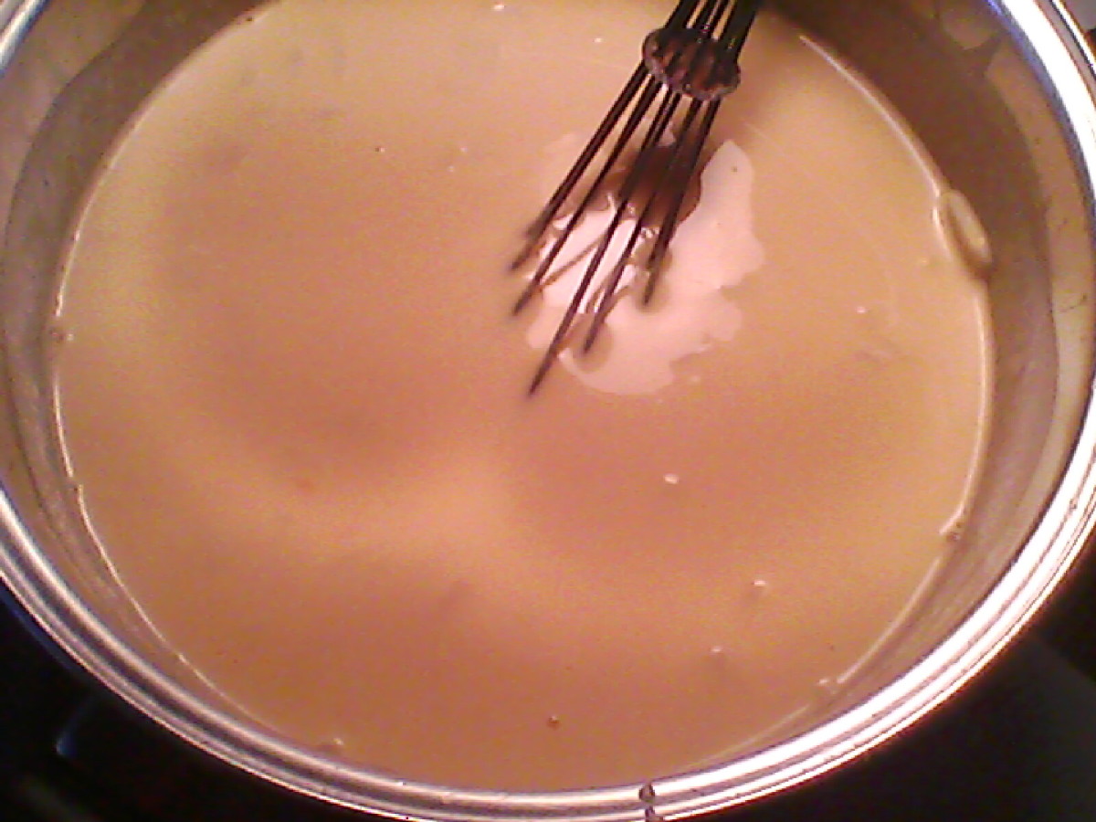 Whisking cheeses until smooth