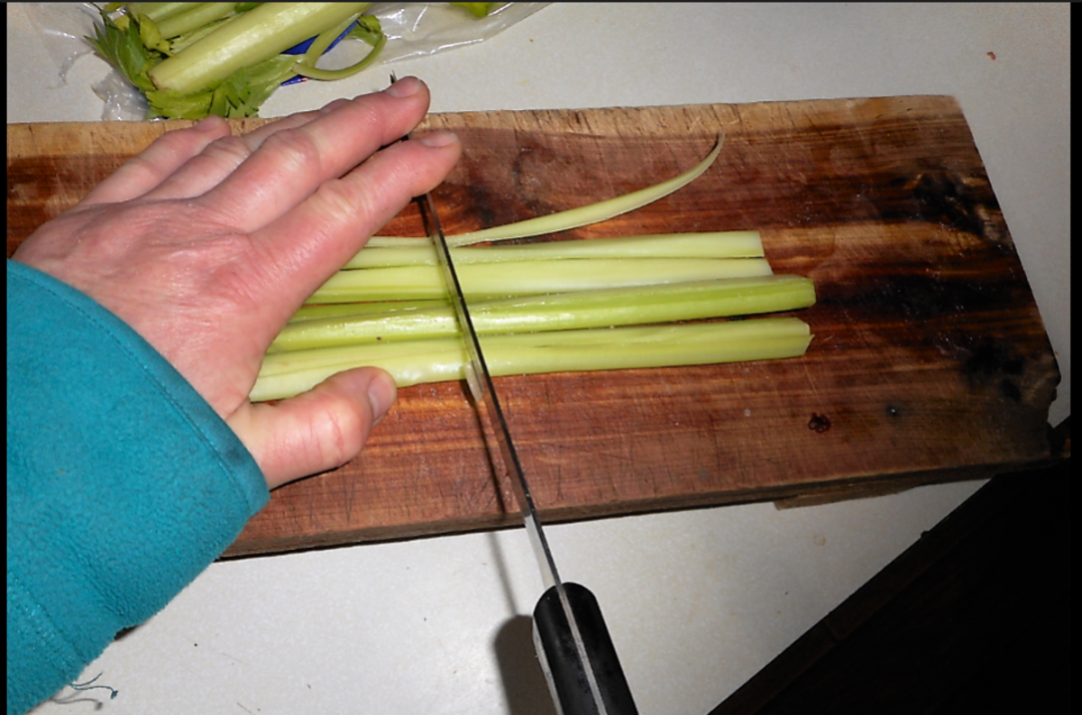 Cut celery in half.