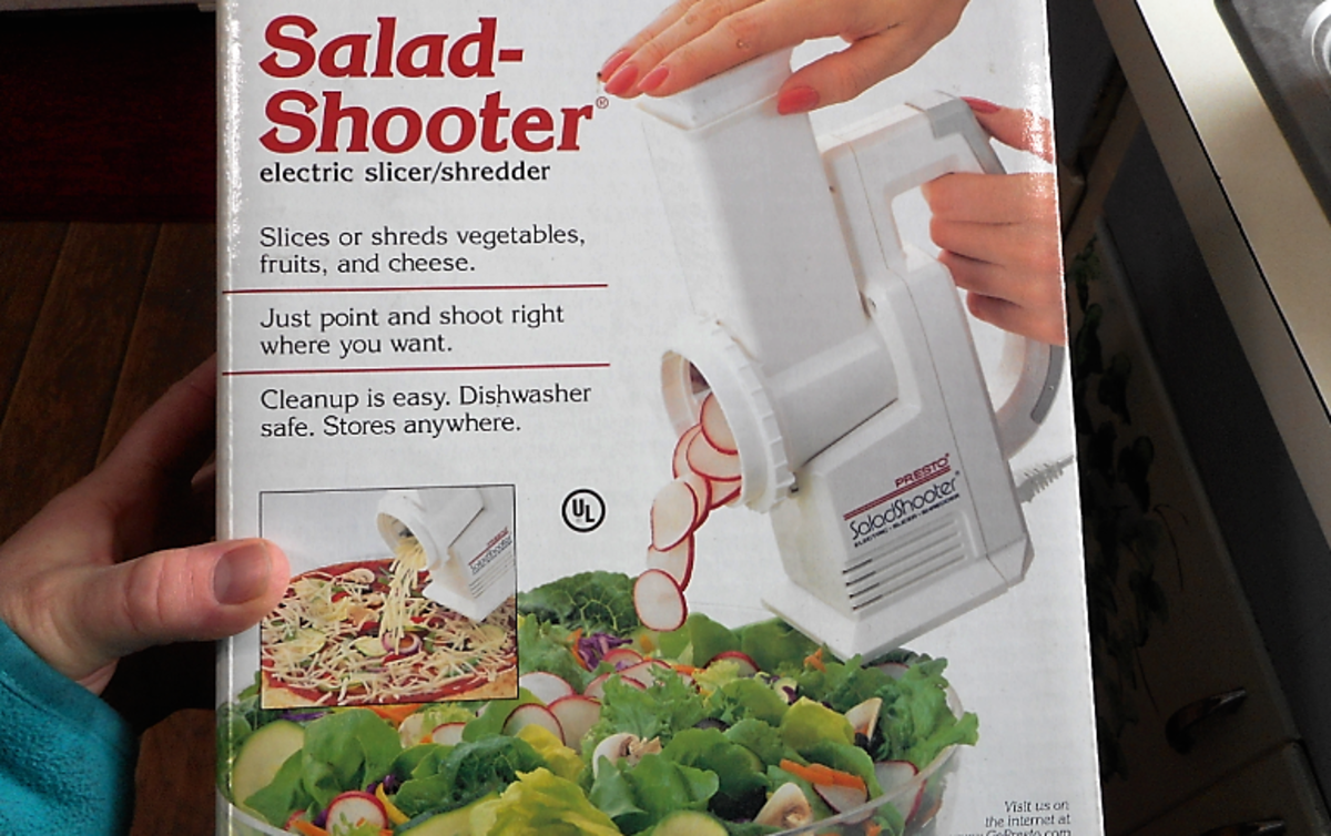 minnesota-cooking-carrots-using-a-salad-shooter-to-grate