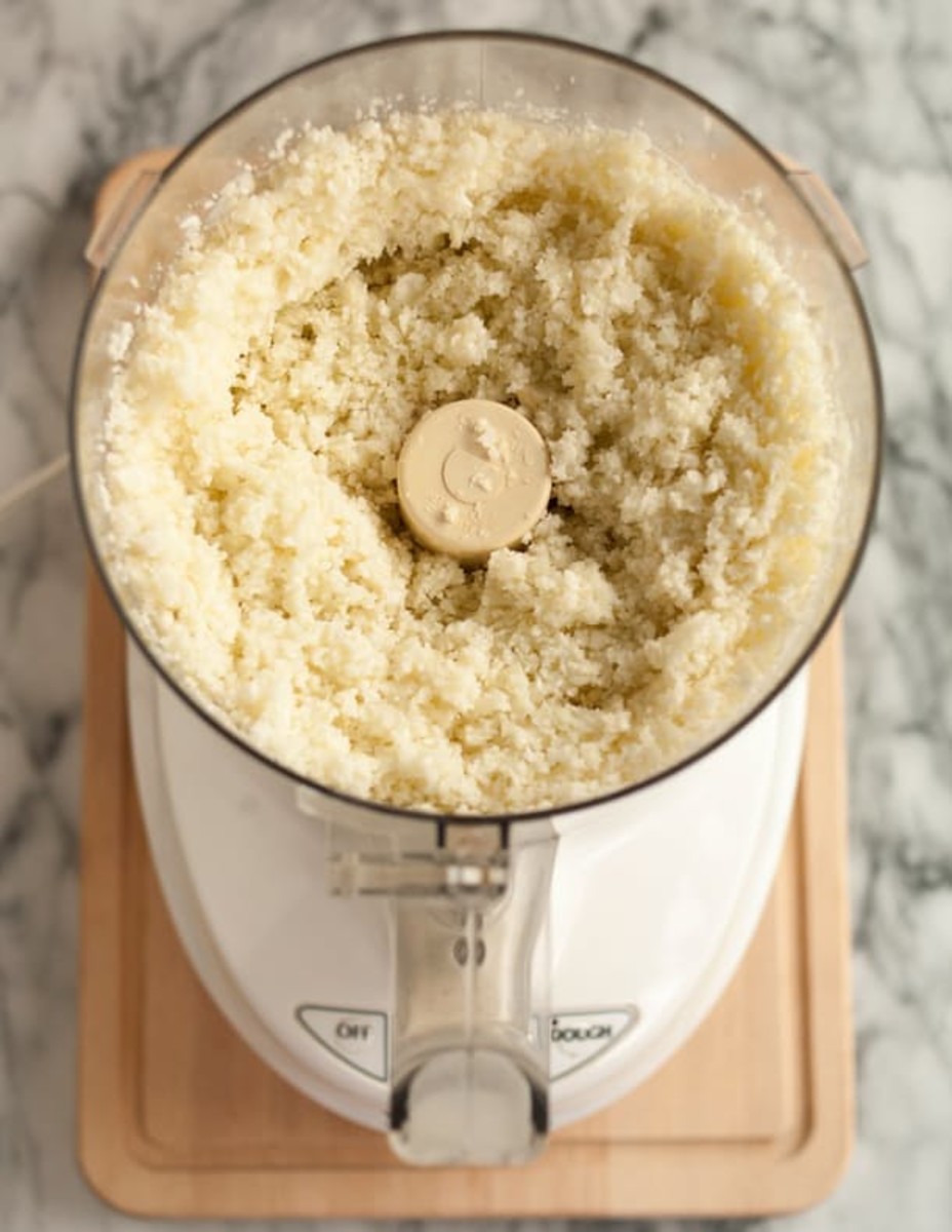 cauliflower "rice" pulsed in bowl of food processor