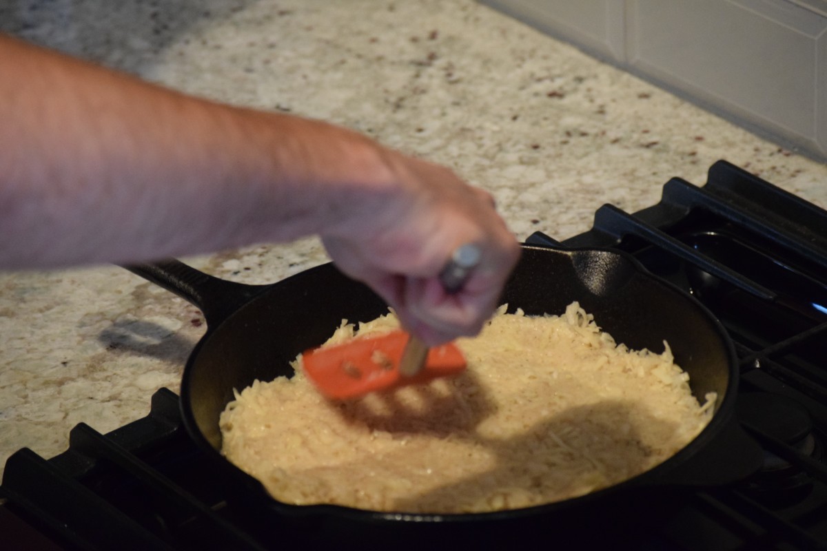 Flatten the mixture into the pan.