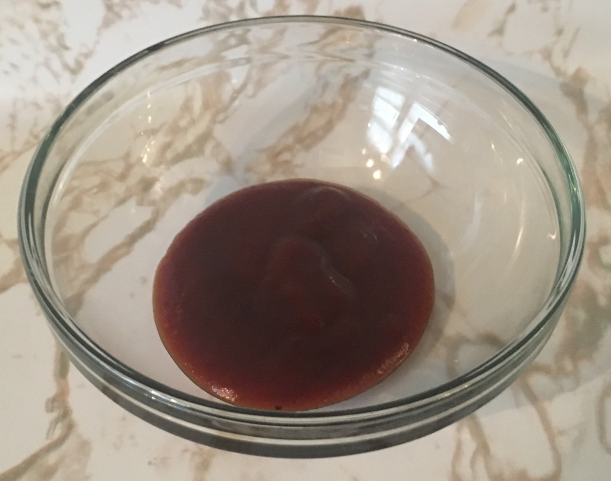 I recommend that you have a small bowl of the BBQ sauce sitting out at room temperature. That way you won't affect the temperature of the ribs too much when you baste them after pulling them out of the oven.